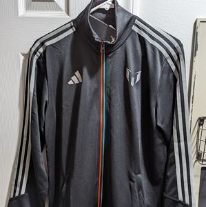 Adidas soccer/athletic jacket. Size Medium. Black in color. Brand new with tags!